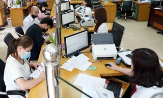 Có nhà băng trả lãi 7,55% cho kỳ hạn tiết kiệm trên 18 tháng (minh hoạ). Ảnh : Như Ý