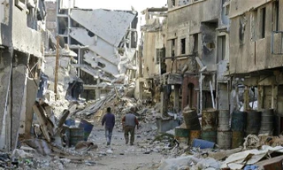 Cảnh tàn phá sau các cuộc xung đột ở Damascus, Syria ngày 3/11. (Ảnh: AFP/TTXVN)