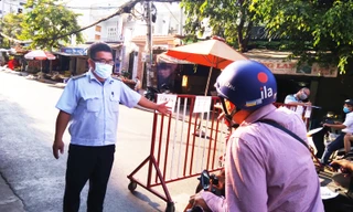 TPHCM kiểm soát từng người vào chợ dân sinh
