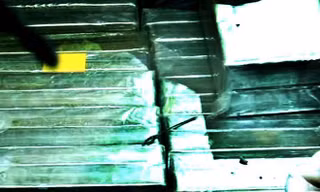 48 bánh heroin tang vật.