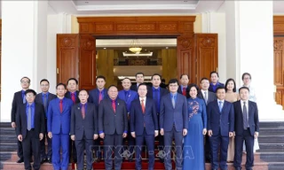 Thường trực Ban Bí thư Võ Văn Thưởng tiếp đồng chí Monexay Laomouasong, sáng 14/9 - Ảnh: TTXVN