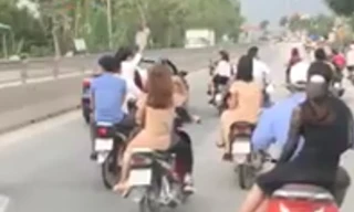Nhóm thanh niên lạng lách đánh võng gây nguy hiểm trên quốc lộ 1A. Ảnh cắt từ clip