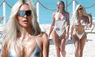 Kim Kardashian diện bikini bé xíu ‘đọ dáng’ với em gái Khloe trên bãi biển