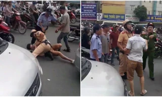 Tài xế taxi vi phạm giao thông bị CSGT quật ngã giữa phố