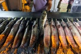 Nhiều tiệm cá lóc nướng thu hàng trăm triệu ngày vía Thần Tài