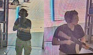 Khoảnh khắc nghi phạm ập vào siêu thị. Ảnh: CCTV