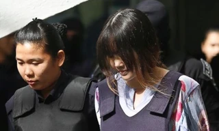 Nghi phạm Đoàn Thị Hương xuất hiện tại tòa sáng nay, 29/1. Ảnh: AP