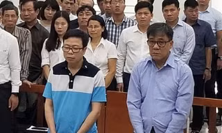 Các bị cáo Nguyễn Tuấn Hùng và Đỗ Văn Khạnh. 