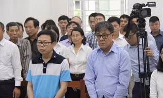 Các bị cáo Nguyễn Tấn Hùng và Đỗ Văn Khạnh.