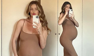 Bạn gái 'Người vận chuyển' Jason Statham diện váy màu nude, khoe bụng bầu 'vượt mặt'