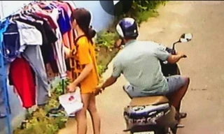 Cô gái bị đối tượng sàm sở khi đang phơi đồ đã bị camera ghi lại. 