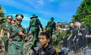 Lực lượng chức năng tổ chức vây ráp, truy tìm phạm nhân Triệu Quân Sự (áo đen) vượt ngục trại giam T10, lẫn trốn ở rừng Hải Vân. Ảnh: Nguyễn Thành