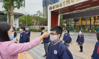 Trường học sẽ phân luồng, đo nhiệt độ khi đón học sinh trở lại. 