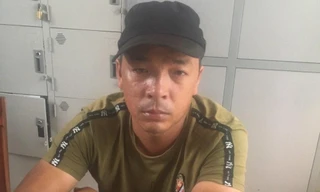 Phạm Viết Hùng tại cơ quan công an