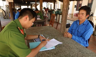 Võ Minh Tâm tại cơ quan công an.