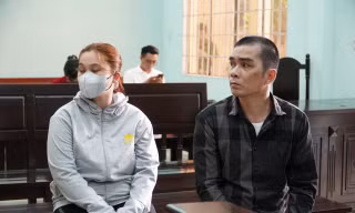 Bị cáo Nguyễn Thảo Nguyên và Lê Văn Bậm tại phiên tòa.