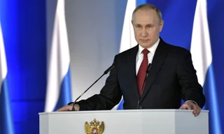 Tổng thống Nga Vladimir Putin đọc thông điệp Liên bang ngày 21/2. (Ảnh: Sputnik)
