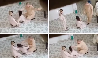 Sư cô tát liên tiếp vào mặt bé gái. Ảnh cắt từ Clip.