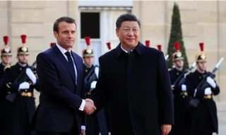 Tổng thống Pháp Emmanuel Macron đón tiếp Chủ tịch Trung Quốc Tập Cận Bình thăm Pháp ngày 25/3. 