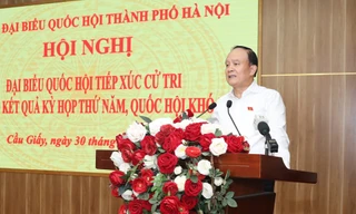 Chủ tịch HĐND Thành phố Nguyễn Ngọc Tuấn phát biểu tại hội nghị tiếp xúc cử tri ngày 30/6.