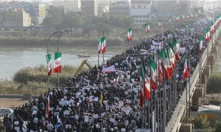 Người Iran ra đường ủng hộ chính phủ, lên án các thế lực bên ngoài can thiệp vào nội bộ đất nước. Ảnh: Reuters