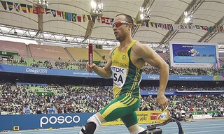 Oscar Pistorius khiến thế giới phải ngưỡng mộ với tinh thần “tàn nhưng không phế” Ảnh: AP