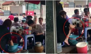 Hình ảnh cắt từ clip rửa chân trong chậu nước pha trà.