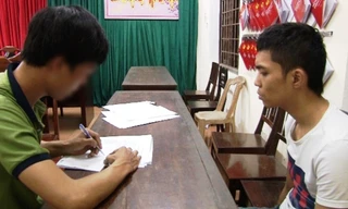 Đối tượng Win tại cơ quan công an (ảnh: A.Phong)