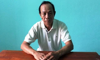 Nghi phạm Nguyễn Quốc Long tại cơ quan công an