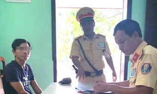 Tài xế H.Q.T tại cơ quan công an.