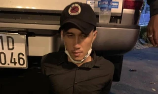 Trương Tín bị bắt khi đang ngồi trong quán cà phê sau khi gây án.