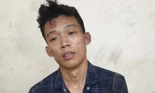 Lê Quang Vinh tại công an.