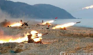 Hình ảnh về cuộc tập trận được đăng tải trên tờ Rodong Shimun của Triều Tiên số ra ngày 21/12.