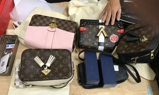 Lô thời trang trị giá hơn 400 triệu giấu trong hành lý xách tay.