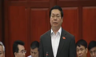 Bộ trưởng Công thương Vũ Huy Hoàng tại phiên chất vấn sáng 1/4. Ảnh chụp màn hình