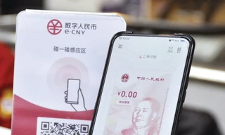 Đồng nhân dân tệ kỹ thuật số được đánh giá là một trong những sáng kiến tiên tiến nhất thế giới. Ảnh: Kyodo 