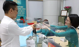 Ngân hàng kết dư hàng triệu tỷ đồng: 'Thúc' dòng tiền đi vào lưu thông 