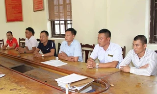 Nhóm đối tượng tại cơ quan công an. Ảnh: TTXVN