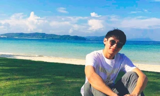 Chàng sinh viên Việt – Lào, cầm Quốc kỳ dẫn đầu đoàn thể thao Lào tại Olympic Tokyo 2020