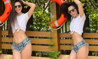 Hiền Thục diện quần short jeans bé tẹo, khoe cơ bụng săn chắc ở tuổi 40