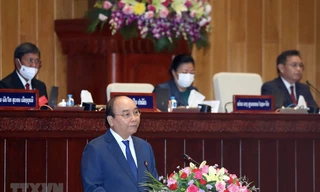 Chủ tịch nước Nguyễn Xuân Phúc phát biểu trước Quốc hội Lào sáng 10/8. (Ảnh: TTXVN)