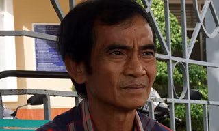 Ông Huỳnh Văn Nén được minh oan đã gần 1 năm, nhưng chưa được nhận tiền bồi thường án oan. Ảnh: Đình Quân