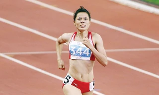 Nguy cơ cô gái vàng Nguyễn Thị Huyền tuột suất tham dự Olympic 2016 là không nhỏ khi cô không có được kế hoạch tập huấn, thi đấu bài bản. Ảnh: VSI