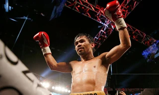 Pacquiao ăn mừng chiến thắng cuối cùng trước khi treo găng. Ảnh: GETTY IMAGES