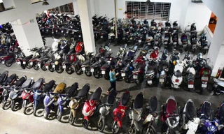 Phi thực tế nếu xây nhà xe xa khu ở?