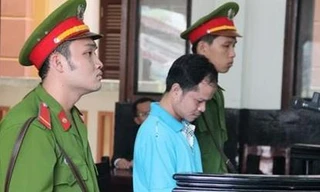 Võ Văn Minh nghe tòa tuyên án ngày 18/12/2015. Ảnh: Tân Châu