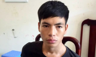 Nguyễn Văn Tuấn tại cơ quan công an. Ảnh: Quang Bình.