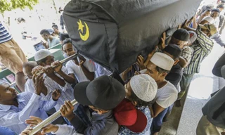 Tang lễ ông Khin Maung Latt ngày 7/3. Ảnh: EPA-EFE