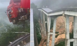 Trung Quốc: Mưa lũ gây sập cầu, tài xế container mắc kẹt trên miệng vực sâu 100m
