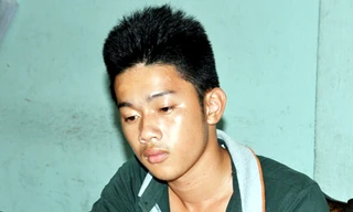 Hoàng Quốc Tú tại cơ quan công an